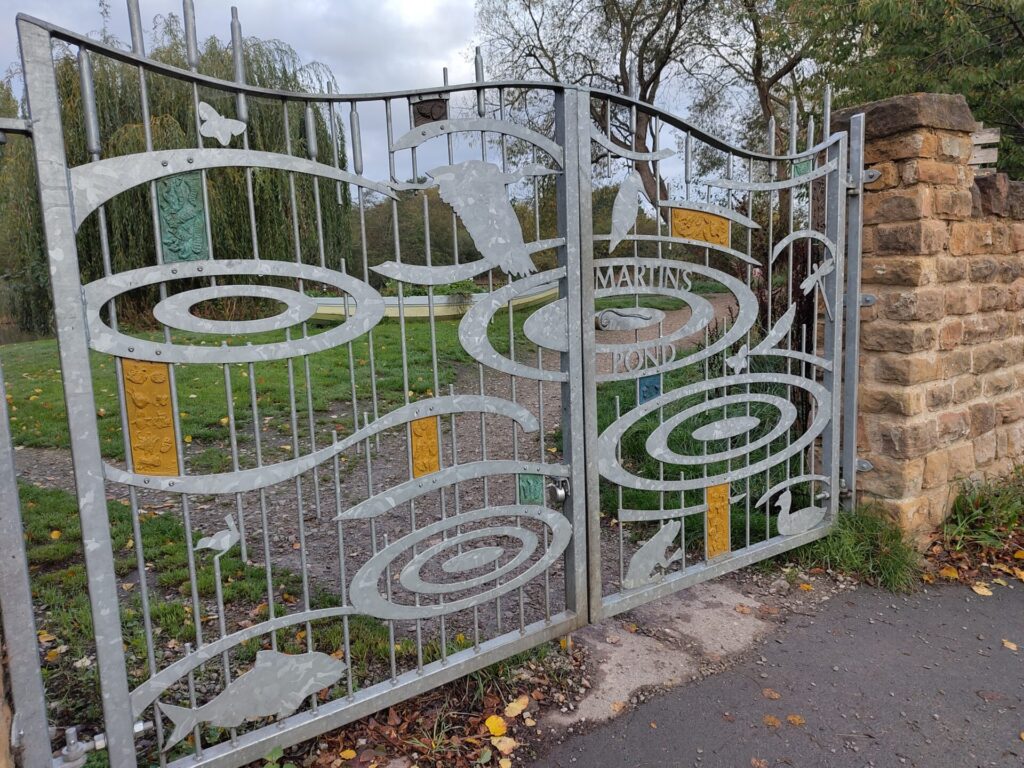 Decorative metal gates to Martins Pond