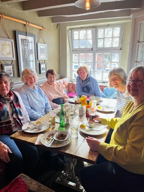 Diners around a table at the Admiral Rodney pub, Wollaton.