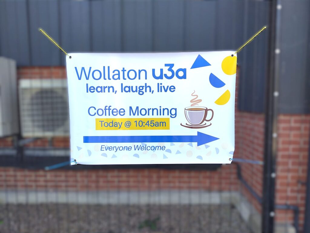The new Wollaton u3a direction sign banner, for coffee mornings at Grangewood Church