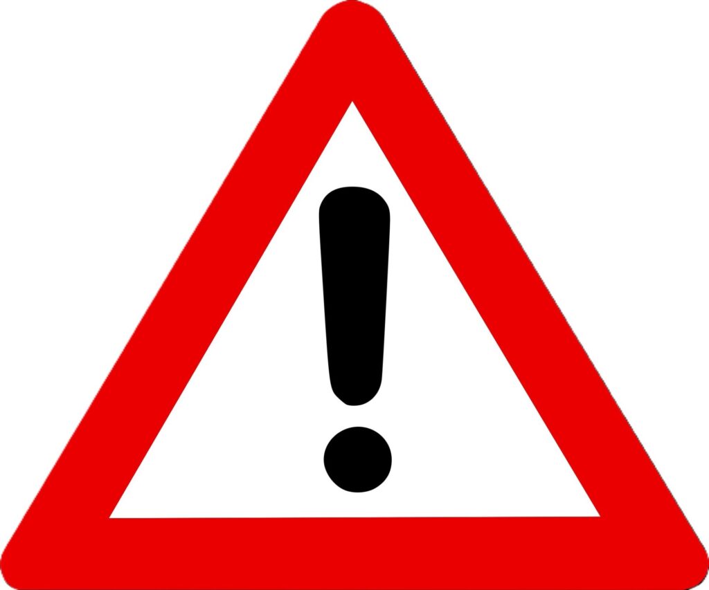 Warning sign graphic - red triangle with black exclamation mark in the middle